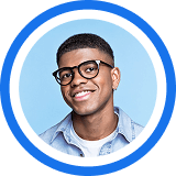 A smiling person wearing glasses and a light blue button-down shirt against a circular blue background